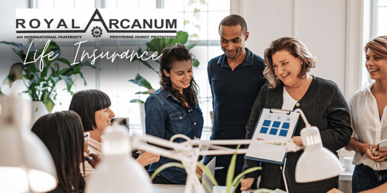 A group of professional individuals from Royal Arcanum Life Insurance engaging in a lively discussion, depicting teamwork and collaboration.